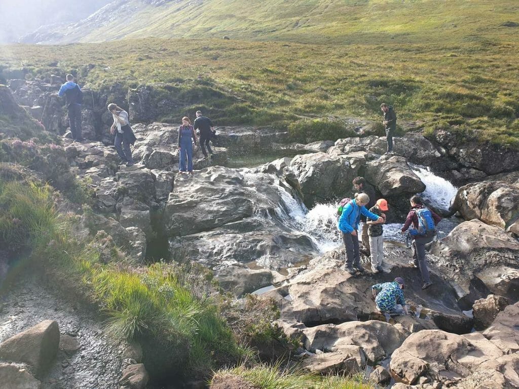 People at the Fairy Pools on Skye