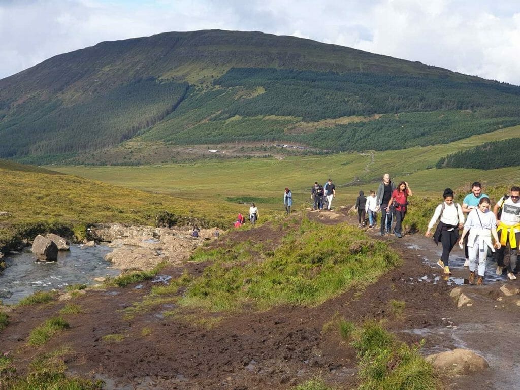 Crowds walking to the Fairy Pools