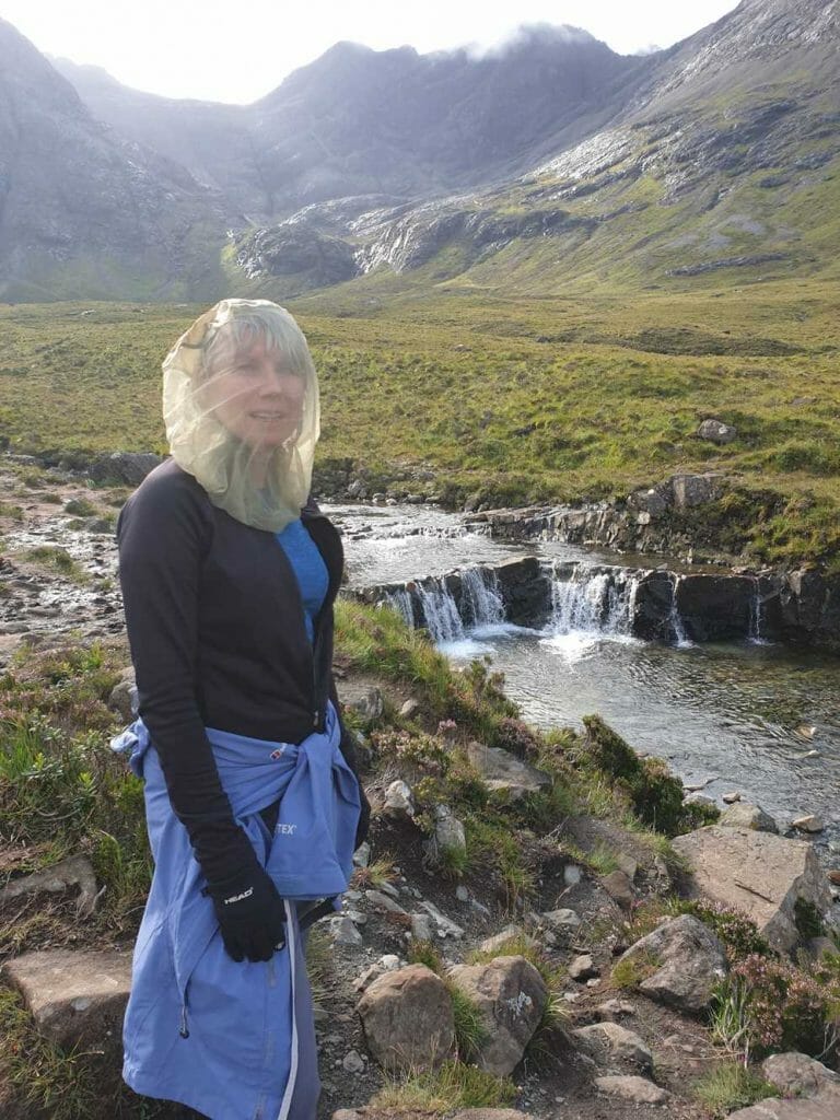 Wearing a midgy net at the Fairy Pools