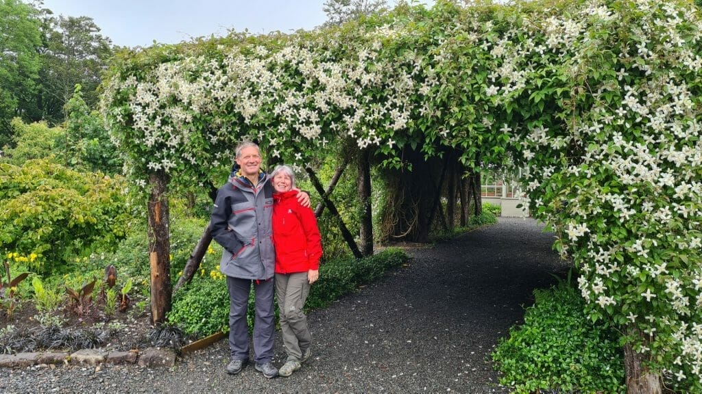 Jane and Peter posing in the walled garden
