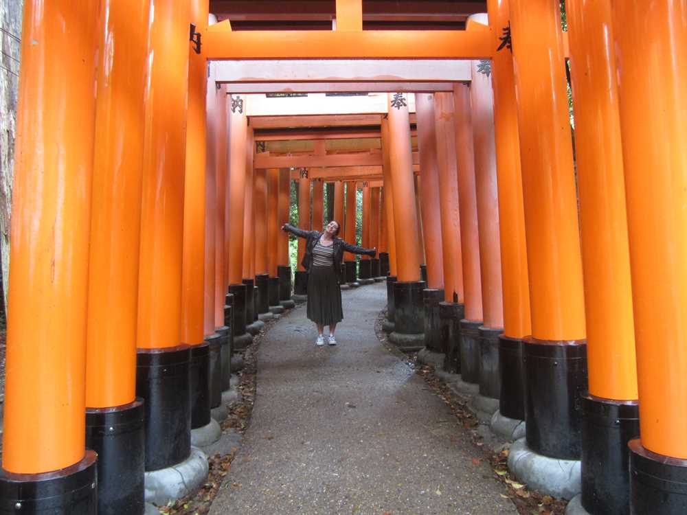 Beth in the red torii gates of the shrine