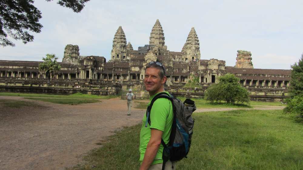 Peter outside Angkor Wat on Cambodia by bike tour