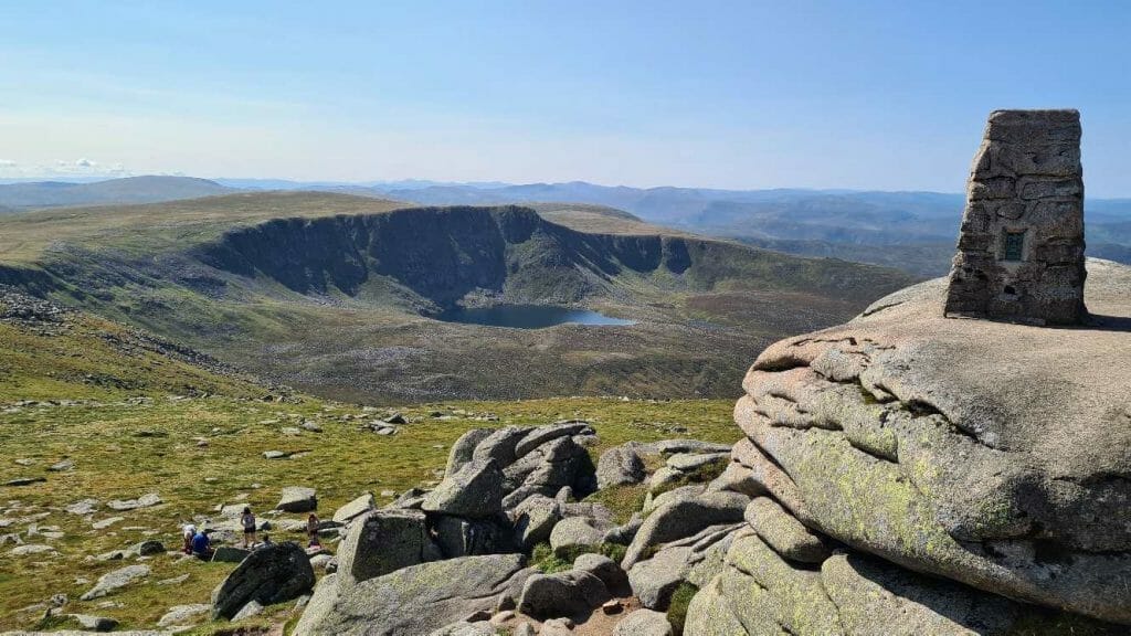 Summit of the Lochnagar hike showing the stone cairn