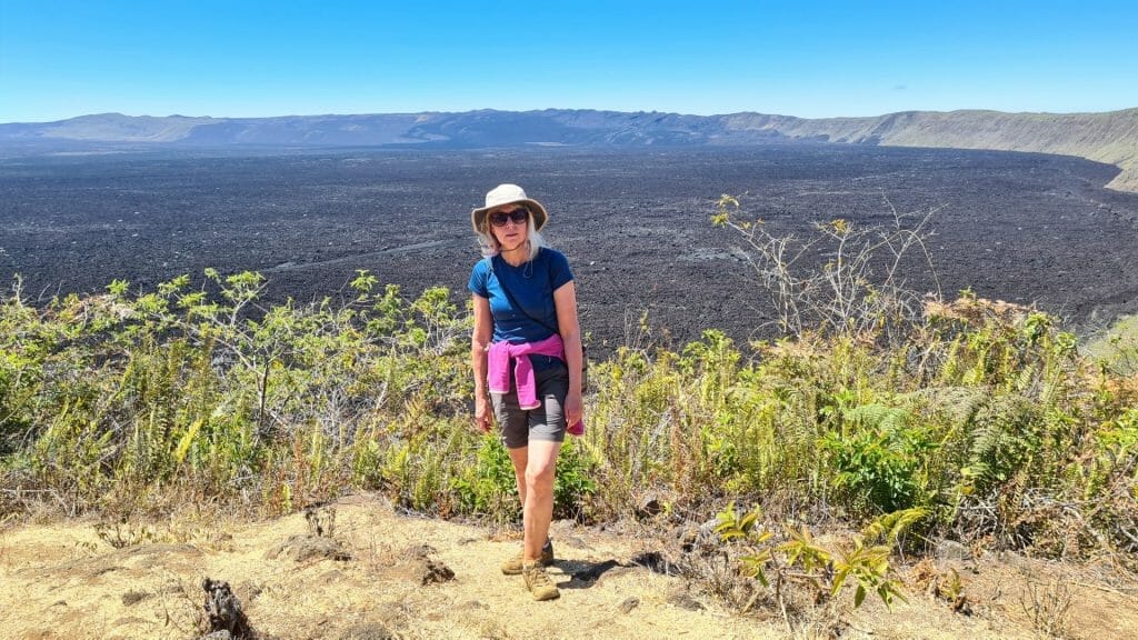 Jane standing on rim of caldera