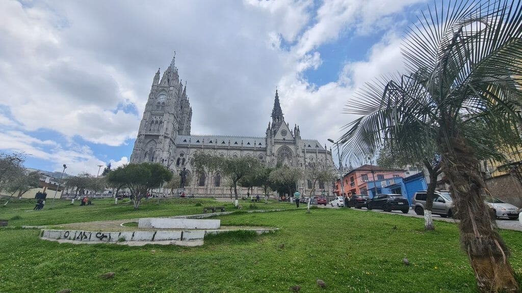 Large white church on hill to show it is worth visiting Quito
