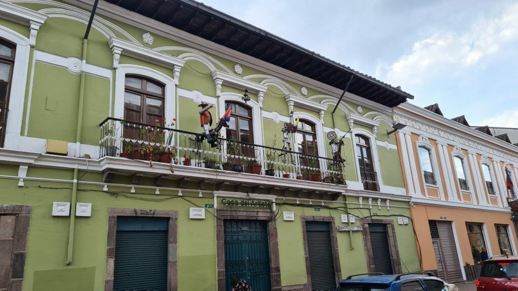 Building with balcony and statues in Quito old town