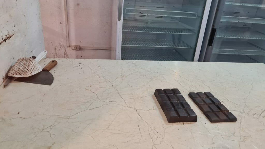 Bars of chocolate on marble slab