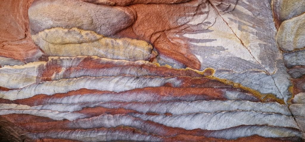 Coloured and patterned rock inside Petra