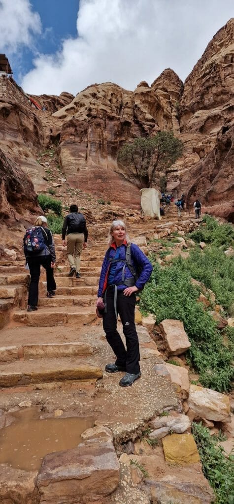 Jane on steps leading up to the Monastery in Petra