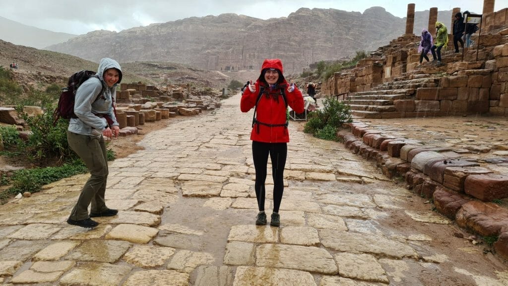 Girls being battered by hailstones on the Colonnaded Street in Petra