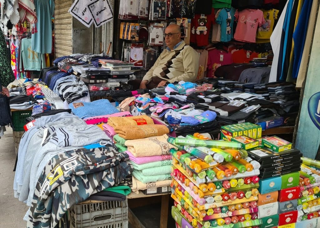 Stall piled high with clothing