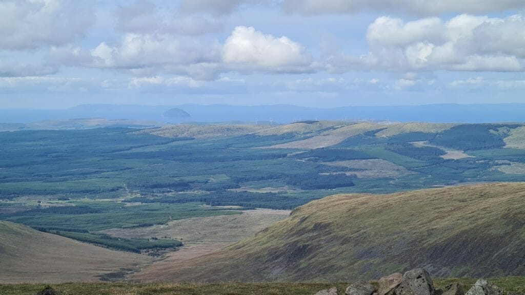 Ailsa Craig in the distance from the top of The Merrick