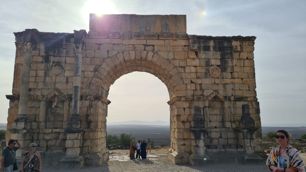 Large triumphal arch with people standing