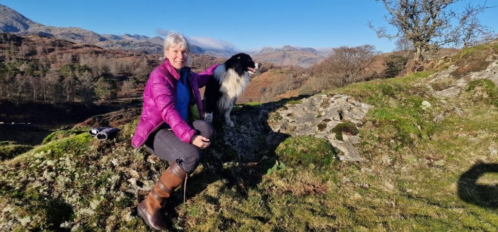 Jane with Jasper with fells in background